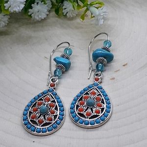 Teardrop shaped dangle earrings available in two colors; turquoise OR carnelian.